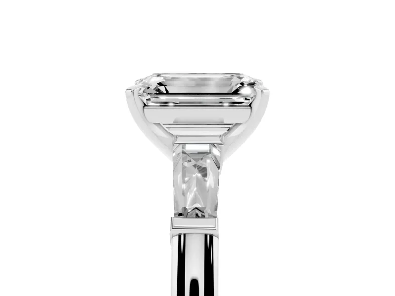 Emerald Cut Diamond Solitaire Ring Set in Platinum with Tapered Baguette Side Stones and Prong Setting