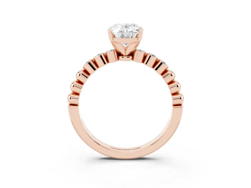 Oval Cut Diamond Solitaire Engagement Ring Set in Rose gold with Bezel Accents on Beaded Band
