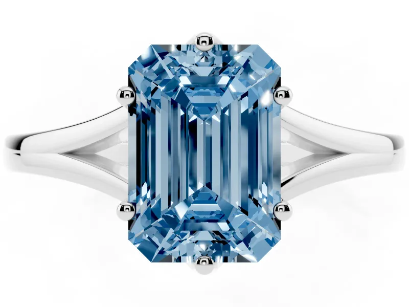 Fancy Blue Emerald Cut Diamond Solitaire Ring Set in Silver with Polished Tapered Band and Prong Setting