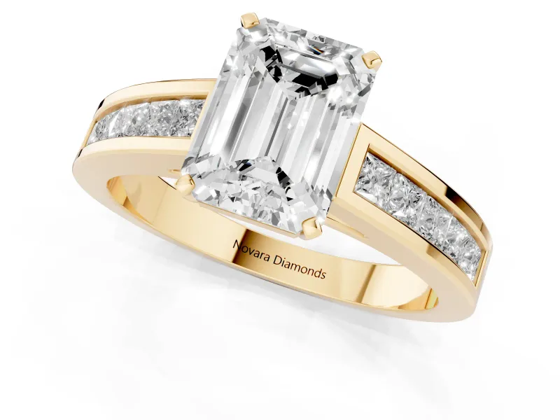 Emerald Cut Diamond Solitaire Ring Set in Yellow gold with Channel-Set Band and Prong Setting