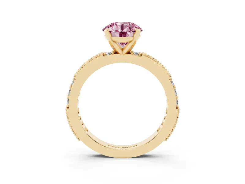 Fancy Pink Round Cut Diamond Solitaire Ring Set in Yellow gold with Slim Pavé Band and Prong Setting