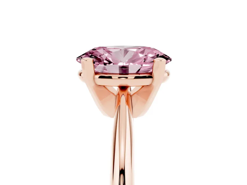 Fancy Pink Oval Cut Diamond Solitaire Ring Set in Rose gold with Prong Setting on a Plain Round Band
