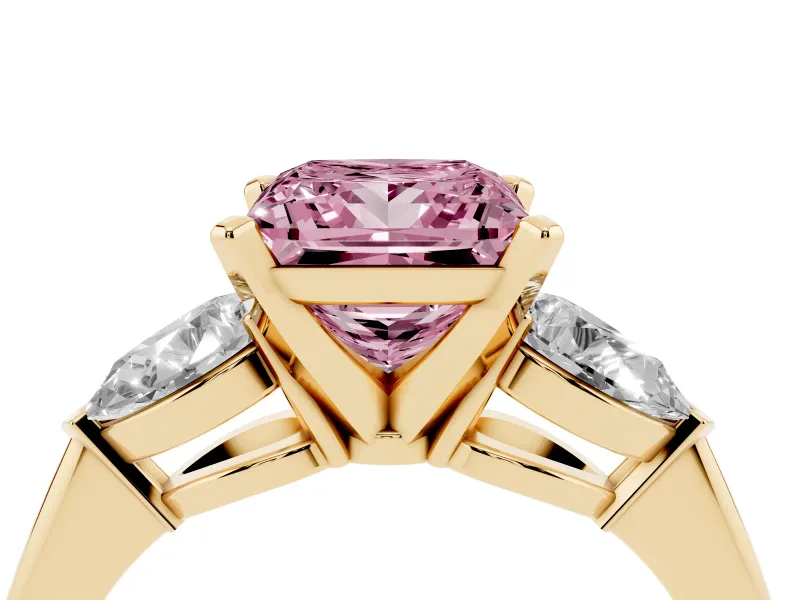Fancy Pink Three-Stone Princess Cut Diamond Ring Set in Yellow gold with Pear Side Stones and Prong Setting