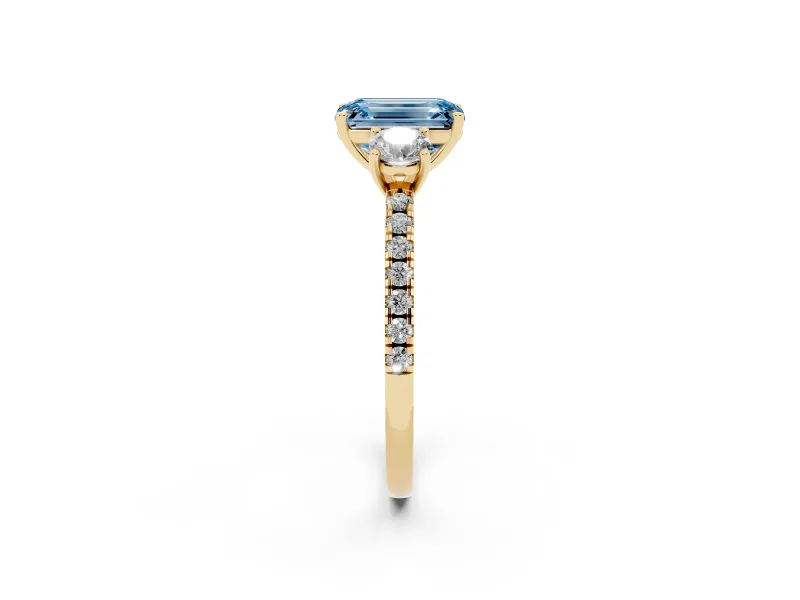 Emerald Cut Three Stone Engagement Ring Setting for a Fancy Blue Lab-Grown Diamond | Pave Shoulders | Yellow Gold