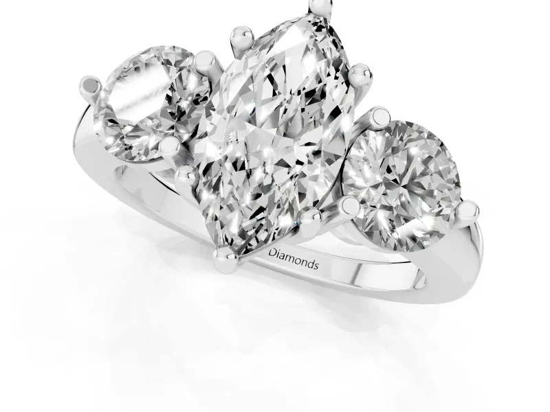 Marquise Cut Diamond Three-Stone Ring Set in White gold with Prong Setting and Classic Band