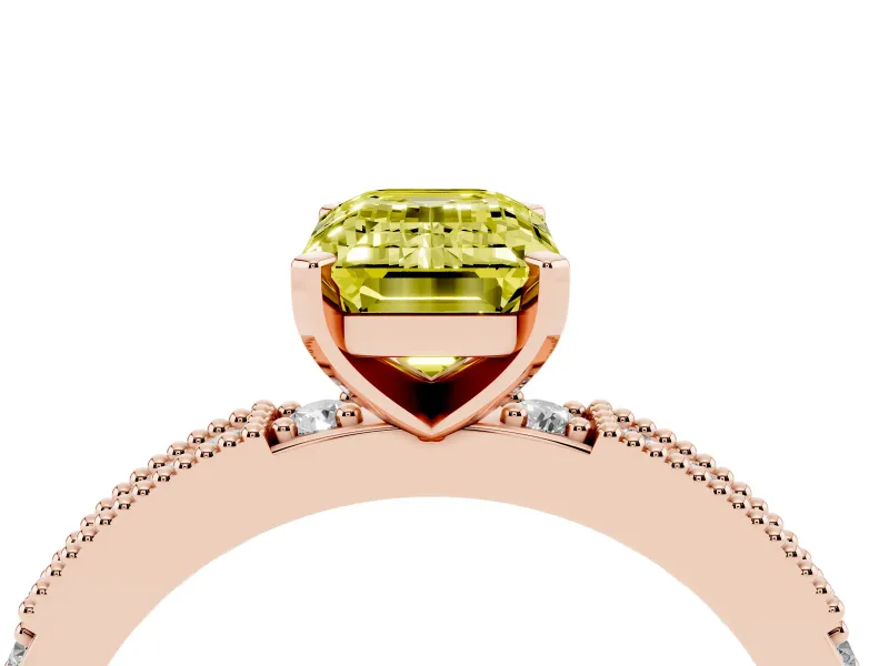 Fancy Yellow Emerald Cut Diamond Solitaire Ring Set in Rose gold with Slim Pavé Band and Prong Setting