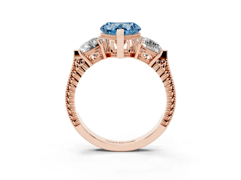 Fancy Blue Heart Cut Diamond Three-Stone Ring Set in Rose gold with Milgrain Band