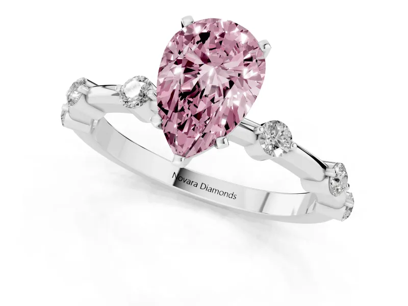 Fancy Pink Pear Cut Diamond Solitaire Ring Set in White gold with Bezel Set Side Stones and Prong Setting