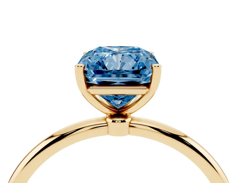 Fancy Blue Radiant Cut Diamond Solitaire Engagement Ring Set in Yellow gold with Thin Band and Prong Setting