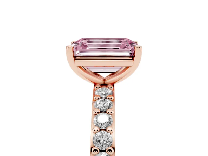 Fancy Pink Emerald Cut Diamond Solitaire Set in Rose gold with Round Pavé Band and Prong Setting