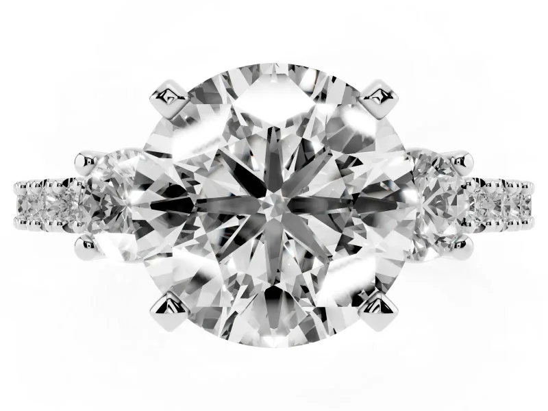 Three-Stone Round Cut Diamond Pavé Band Ring Set in Platinum with Prong Setting