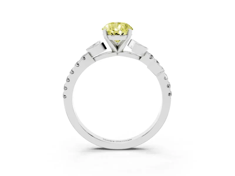 Fancy Yellow Pear Cut Diamond Solitaire Leaf-Inspired Ring Set in Platinum with Pavé Band and Prong Setting