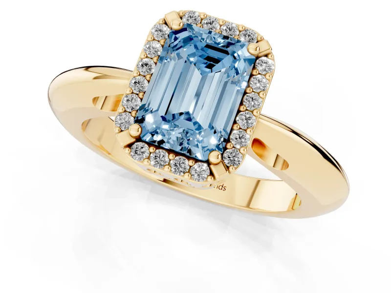 Fancy Blue Emerald Cut Diamond Halo Engagement Ring Set in Yellow gold with Plain Split Shank and Prong Setting