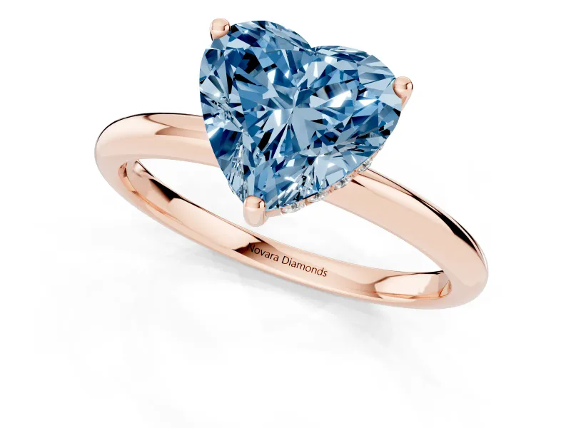Fancy Blue Heart Cut Diamond Solitaire Engagement Ring Set in Rose gold with Prong Setting and Polished Band