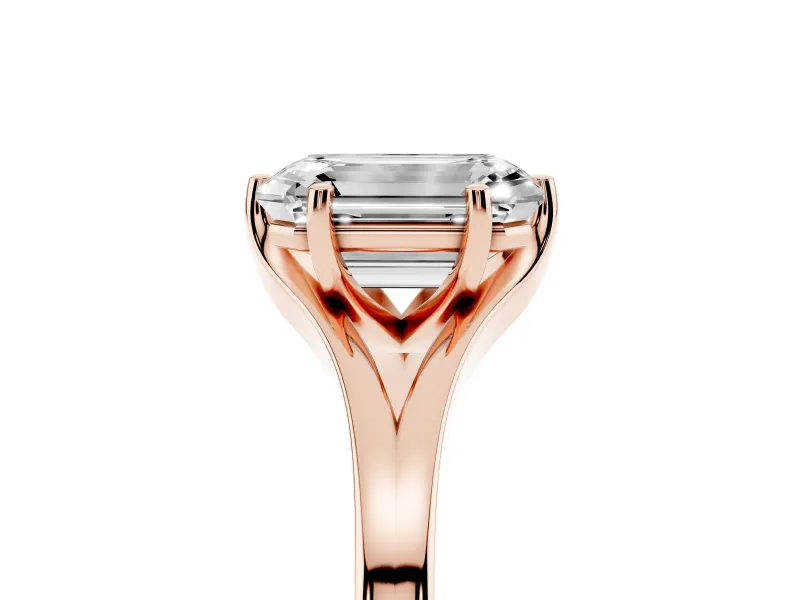 Emerald Cut Diamond Solitaire Ring Set in Rose gold with Polished Tapered Band and Prong Setting