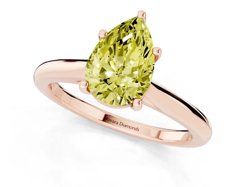 Fancy Yellow Pear Cut Diamond Solitaire Ring Set in Rose gold with Cathedral Band and Prong Setting
