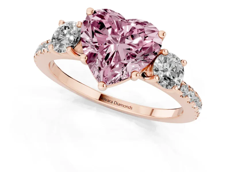 Heart-Shaped Three Stone Engagement Ring Setting for a Fancy Pink Lab-Grown Diamond | Pave Shoulders | Rose Gold