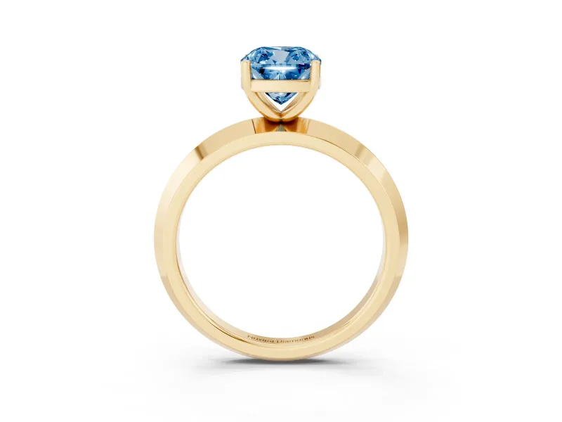 Fancy Blue Cushion Cut Diamond Solitaire Engagement Ring Set in Yellow gold with Flat Band and Prong Setting