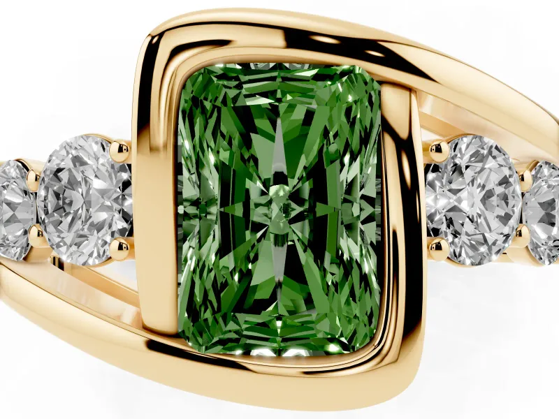 Fancy Green Radiant Cut Diamond Bezel Bypass Ring Set in Yellow gold with Round Accents
