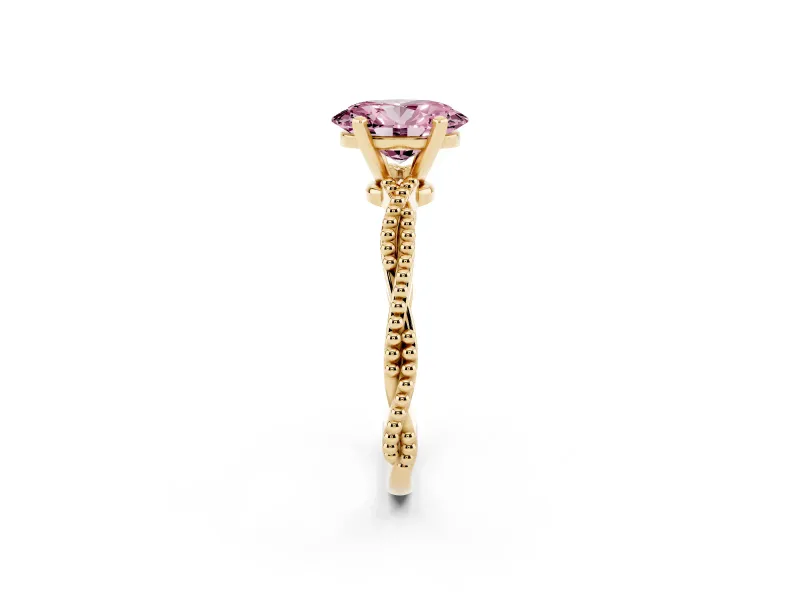 Fancy Pink Oval Cut Diamond Solitaire Ring Set in Yellow gold with Twisted Band and Bead Prong Setting