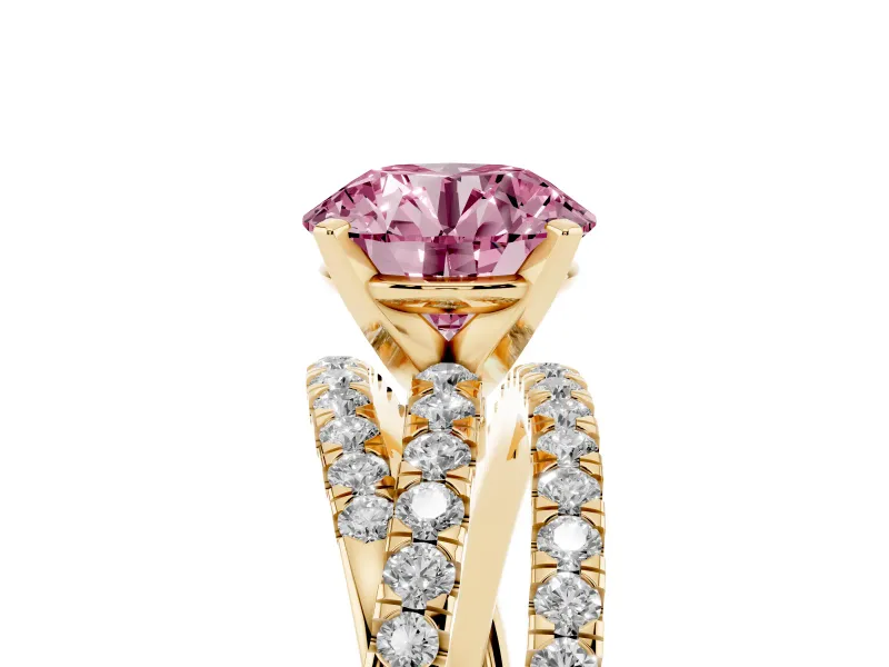 Fancy Pink Round Cut Diamond Solitaire Twist Band Ring Set in Yellow gold with Pavé Setting and Prong Head