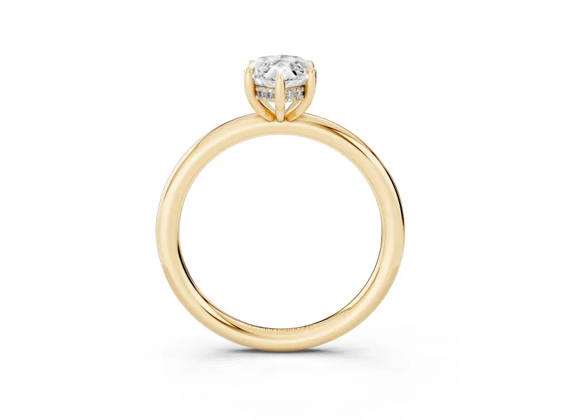 Marquise Cut Diamond Solitaire Ring Set in Yellow gold with Thin Band and Prong Setting