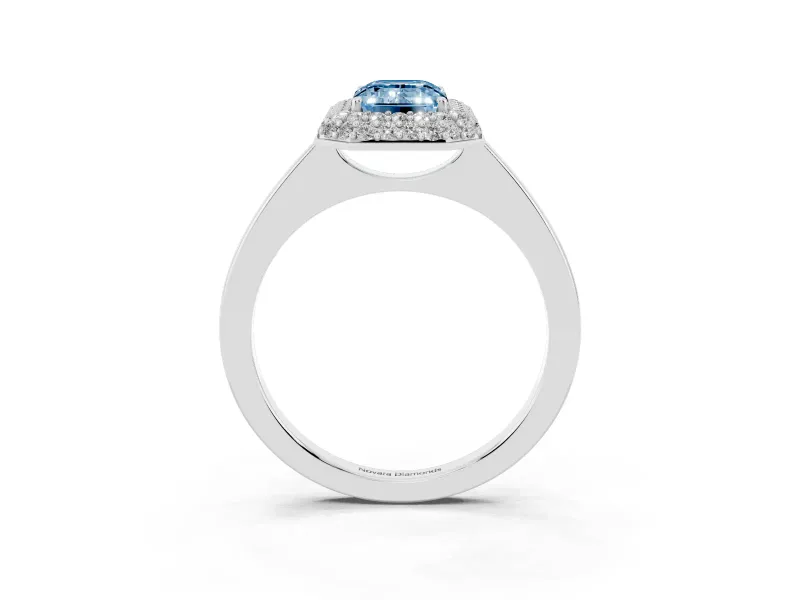 Fancy Blue Emerald Cut Diamond Halo Engagement Ring Set in Silver with Solitaire Band and Prong Setting