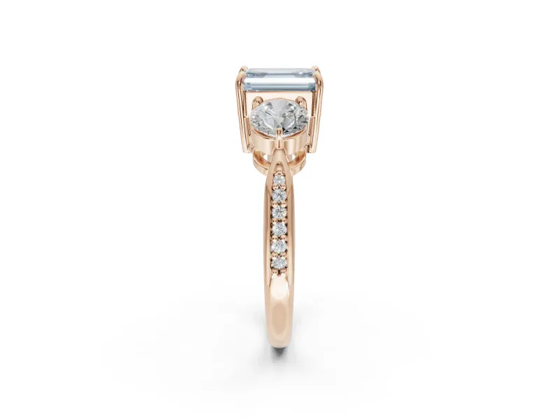 Emerald Cut Three Stone Engagement Ring Setting for a Fancy Blue Lab-Grown Diamond | Tapered Pave Band | Rose Gold
