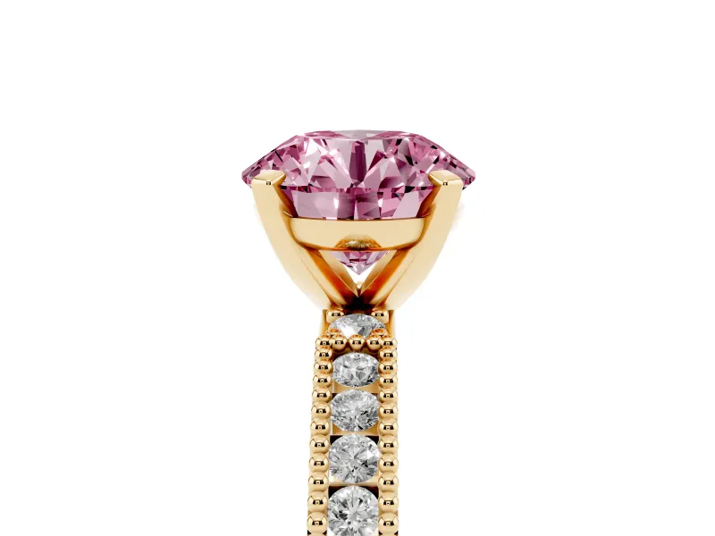 Fancy Pink Round Cut Diamond Solitaire Ring Set in Yellow gold with Slim Pavé Band and Prong Setting