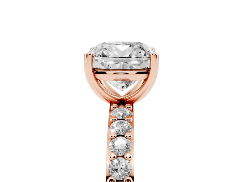 Cushion Cut Diamond Solitaire Set in Rose gold with Round Pavé Band and Prong Setting