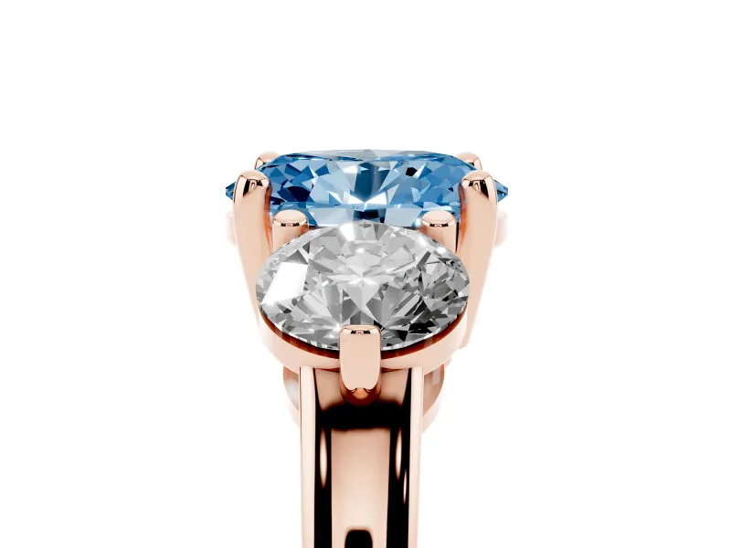 Fancy Blue Oval Cut Diamond Three-Stone Ring Set in Rose gold with Prong Setting and Classic Band