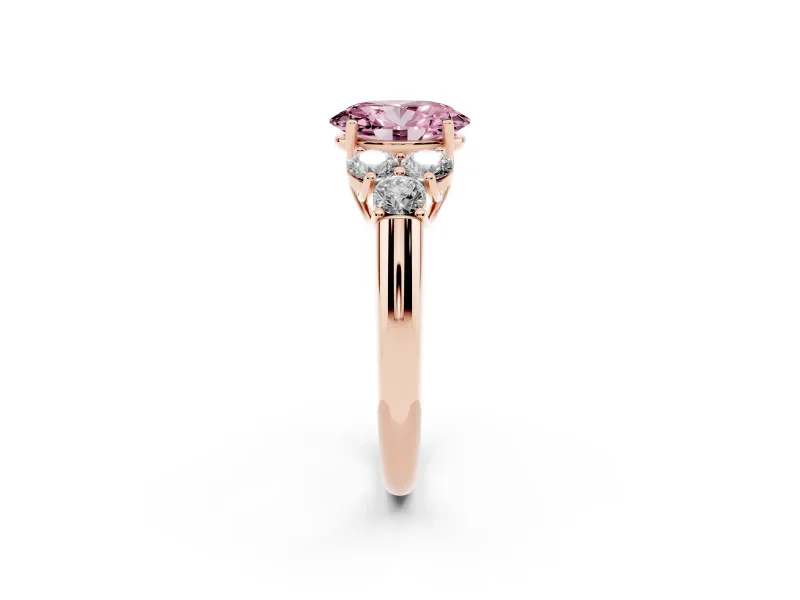 Fancy Pink Oval Cut Diamond Cluster Ring Set in Rose gold with Round Accent Stones and Prong Setting on a Plain Band
