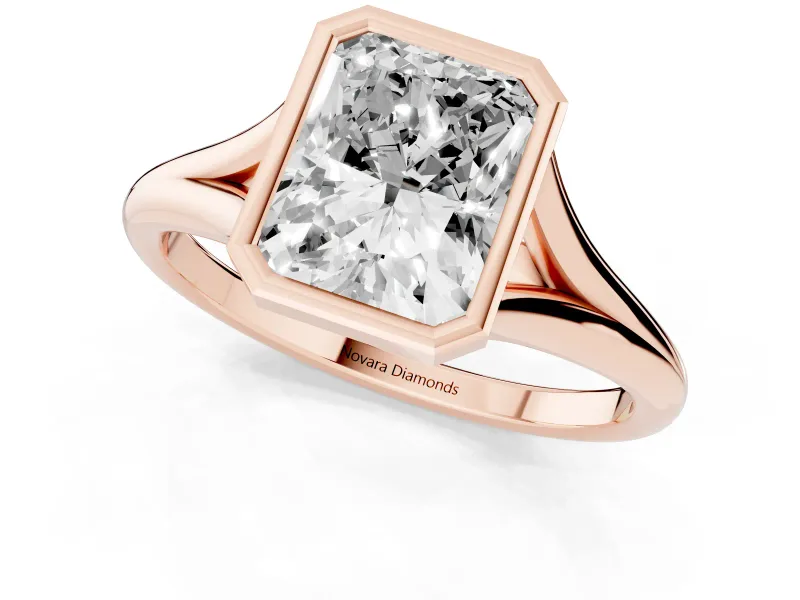 Bezel Set Radiant Cut Diamond Solitaire Ring Set in Rose gold with Tapered Band