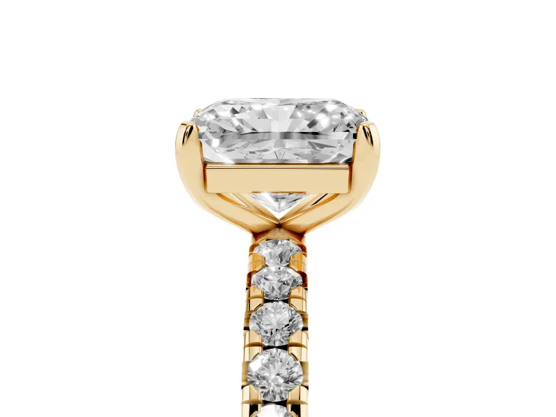 Radiant Cut Diamond Pavé Solitaire Ring Set in Yellow gold with Round Band and Prong Setting