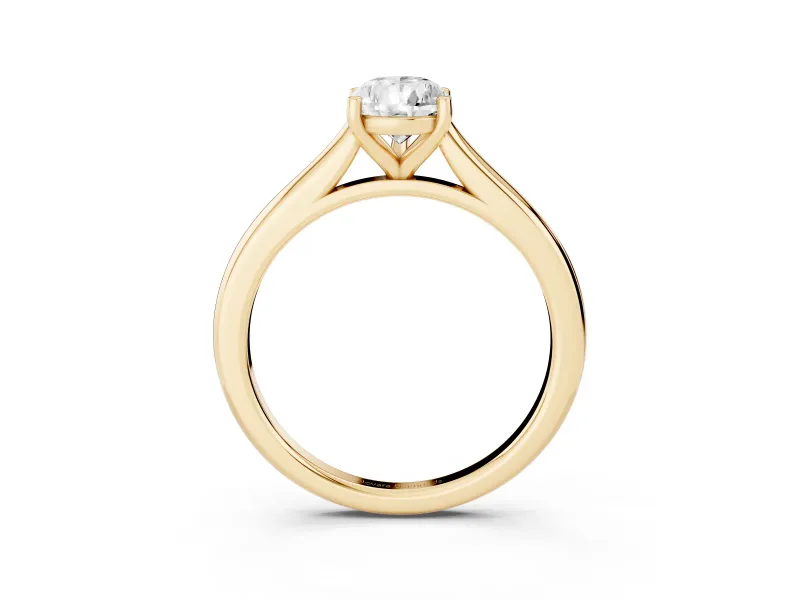 Pear Cut Diamond Solitaire Ring Set in Yellow gold with Cathedral Band and Prong Setting