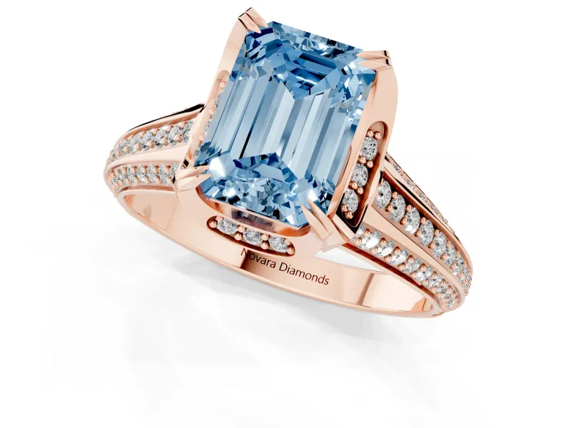 Fancy Blue Emerald Cut Diamond Pavé Split Shank Solitaire Ring Set in Rose gold with Prong Setting