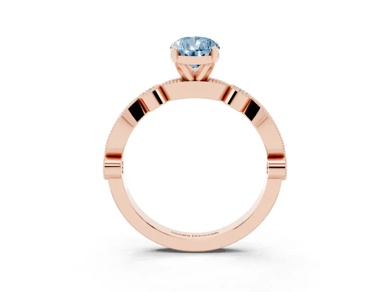 Fancy Blue Pear Cut Diamond Solitaire Engagement Ring Set in Rose gold with Milgrain Bezel Accent Band