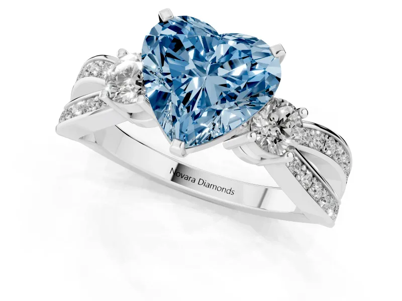 Fancy Blue Three-Stone Heart Cut Diamond Twist Band Ring Set in White gold with Pavé Accents and Prong Setting