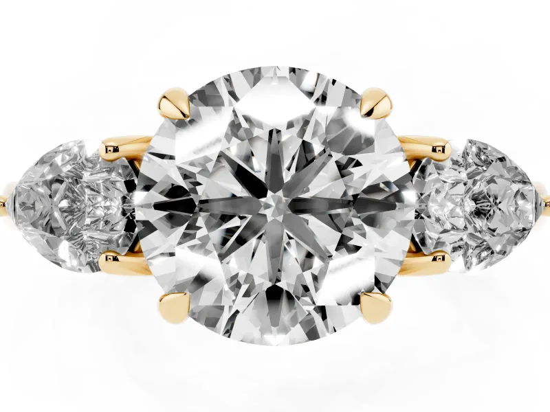 Round Three Stone Engagement Ring Setting | Pear Side Stones | Yellow Gold