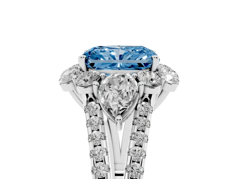 Fancy Blue Radiant Cut Diamond Halo Split Shank Engagement Ring Set in White gold with Prong-Held Center Stone