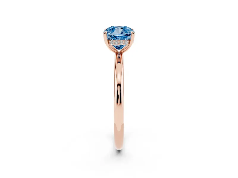 Fancy Blue Cushion Cut Diamond Solitaire Ring Set in Rose gold with Thin Band and Prong Setting