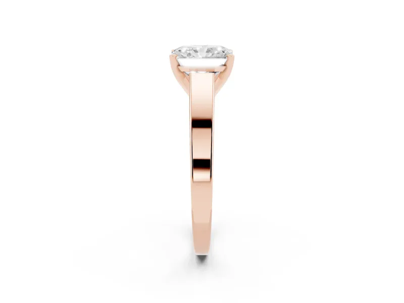 Radiant Cut Diamond Solitaire Engagement Ring Set in Rose gold with Prong Setting and Tapered Band