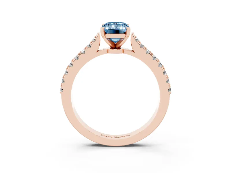 Fancy Blue Emerald Cut Diamond Solitaire Engagement Ring Set in Rose gold with Delicate Pavé Band and Prong Setting
