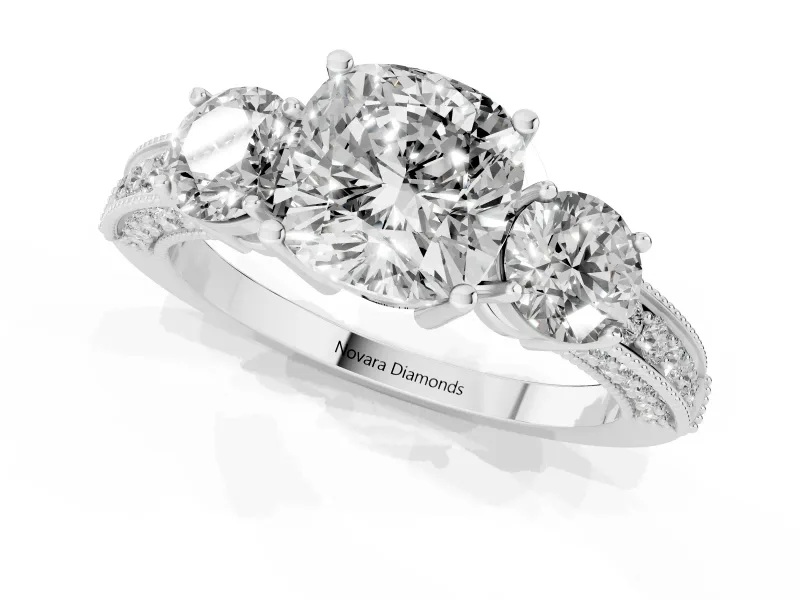 Cushion Cut Diamond Three-Stone Ring Set in Silver with Round Side Stones and Pavé Band