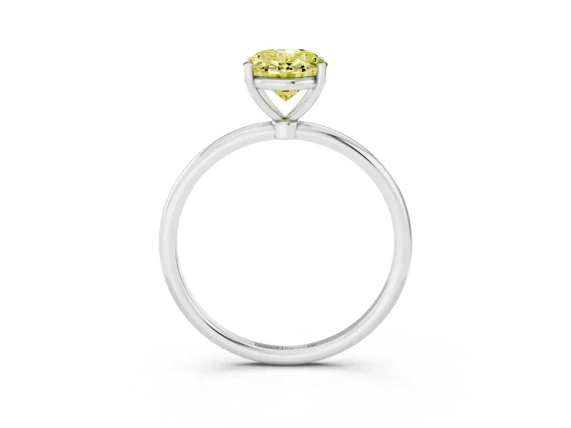 Fancy Yellow Oval Cut Diamond Solitaire Engagement Ring Set in Silver with Thin Band and Prong Setting