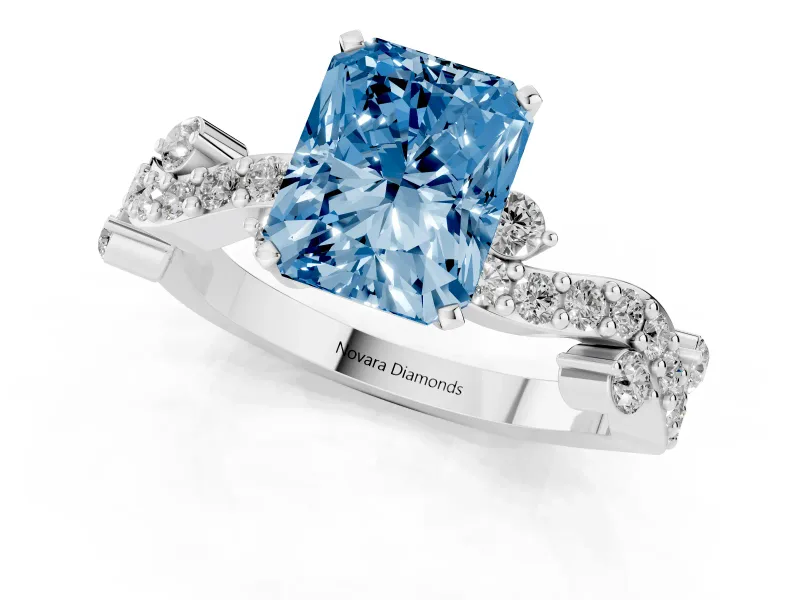 Fancy Blue Radiant Cut Diamond Solitaire Twisted Band Set in White gold with Pavé Setting