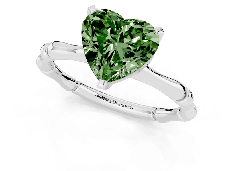 Fancy Green Heart Cut Diamond Solitaire Ring Set in Platinum with Bamboo Band and Prong Setting