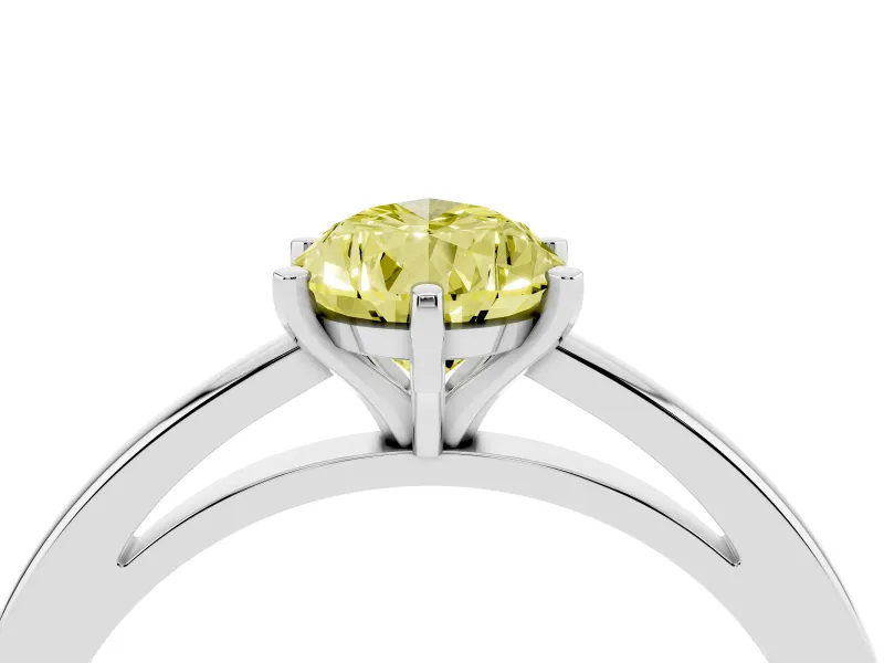 Fancy Yellow Pear Cut Diamond Solitaire Engagement Ring Set in White gold with Prong Setting on a Classic Band