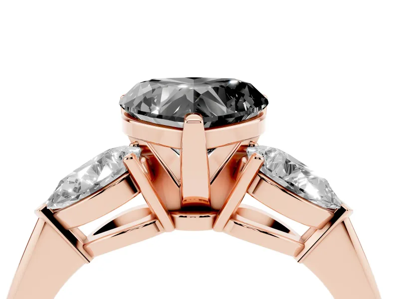Fancy Black Three-Stone Heart Cut Diamond Ring Set in Rose gold with Pear Side Stones and Prong Setting