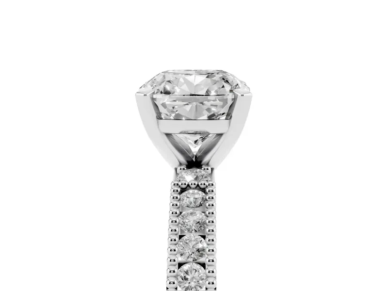 Cushion Cut Diamond Solitaire Ring Set in White gold with Slim Pavé Band and Prong Setting